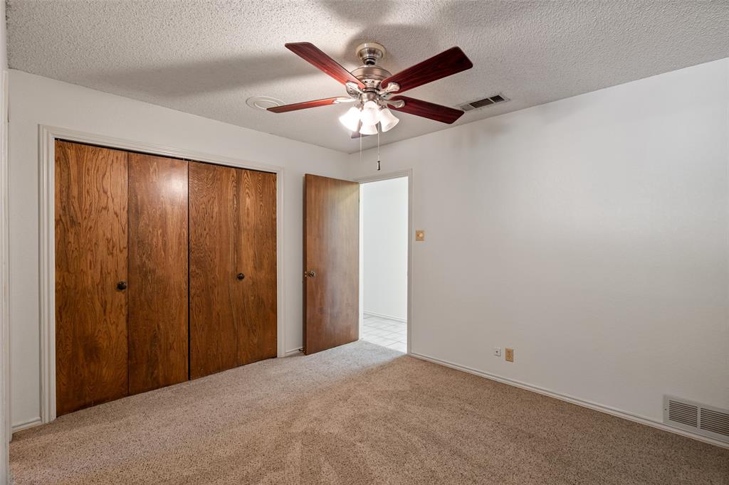 7508 Ravenswood Road Granbury, TX 76049 - Photo 27 of 40 a view of an empty room