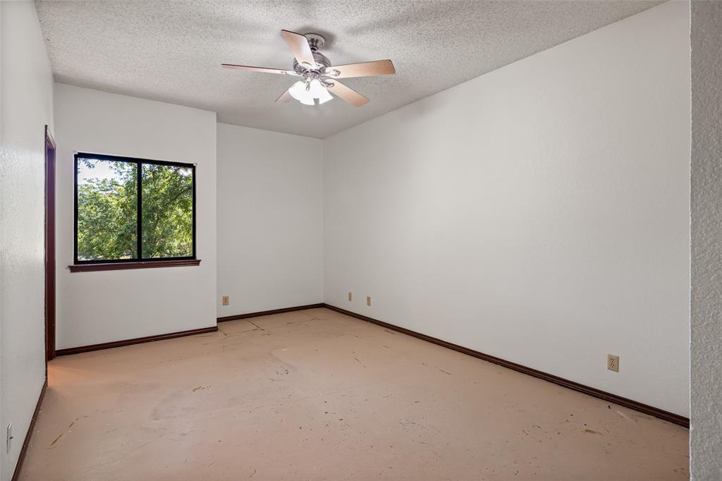 7508 Ravenswood Road Granbury, TX 76049 - Photo 30 of 40 an empty room with a window