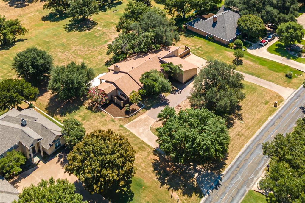 7508 Ravenswood Road Granbury, TX 76049 - Photo 40 of 40 an aerial view of residential houses with outdoor space