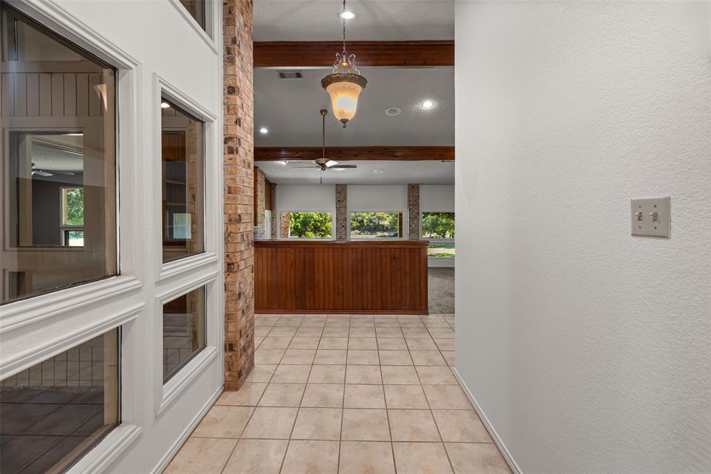 7508 Ravenswood Road Granbury, TX 76049 - Photo 5 of 40 a view of a entryway door of the house
