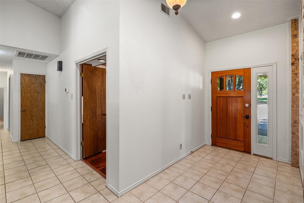 7508 Ravenswood Road Granbury, TX 76049 - Photo 6 of 40 a view of an empty room