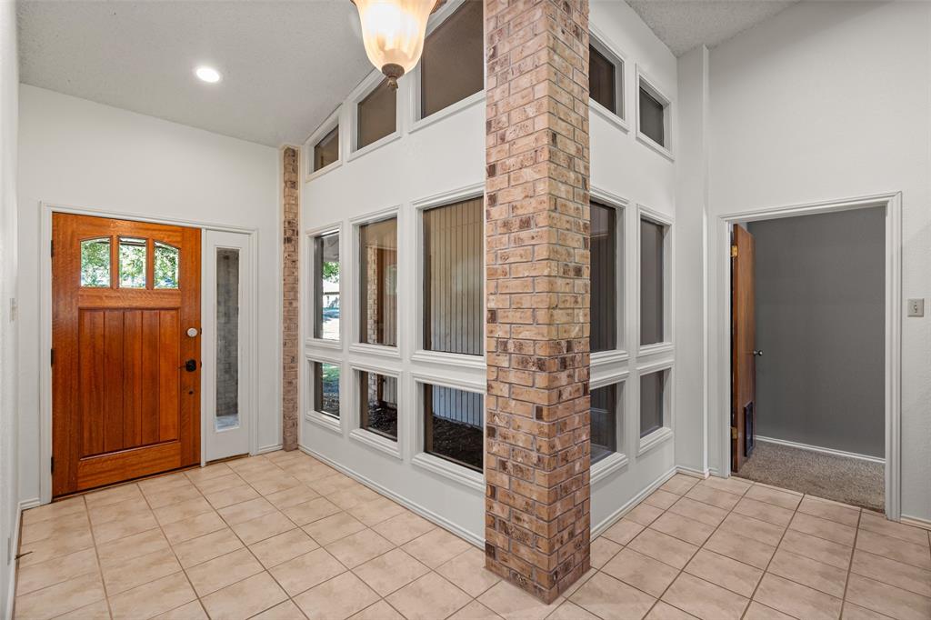 7508 Ravenswood Road Granbury, TX 76049 - Photo 7 of 40 a view of front door of house