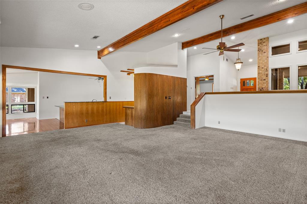 7508 Ravenswood Road Granbury, TX 76049 - Photo 10 of 40 a view of a big room with closet and windows