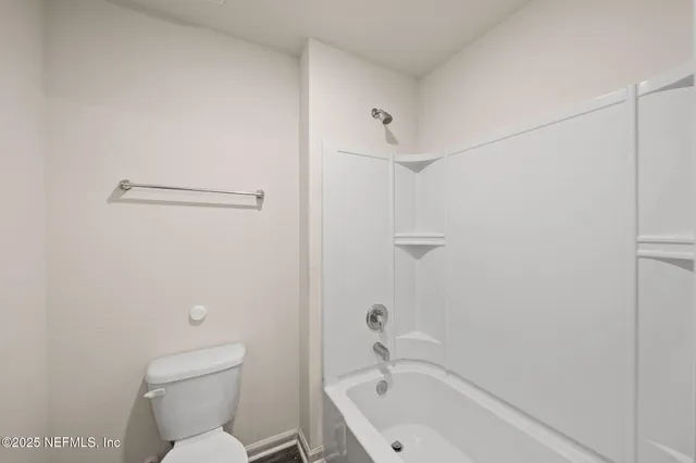 a bathroom with a sink and toilet