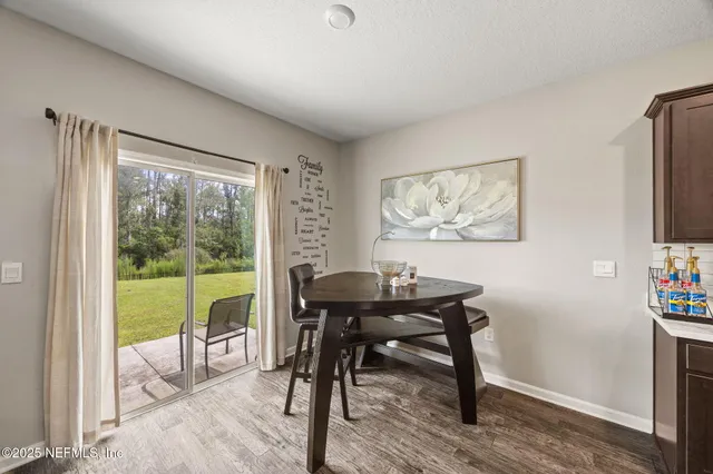 a view of a livingroom with furniture window and outside view