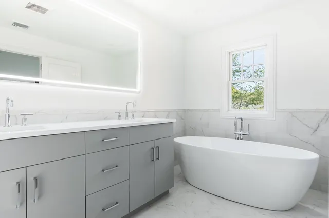 a bathroom with a sink and a bathtub