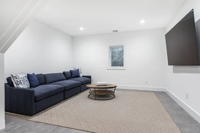 a living room with a couch and a flat screen tv