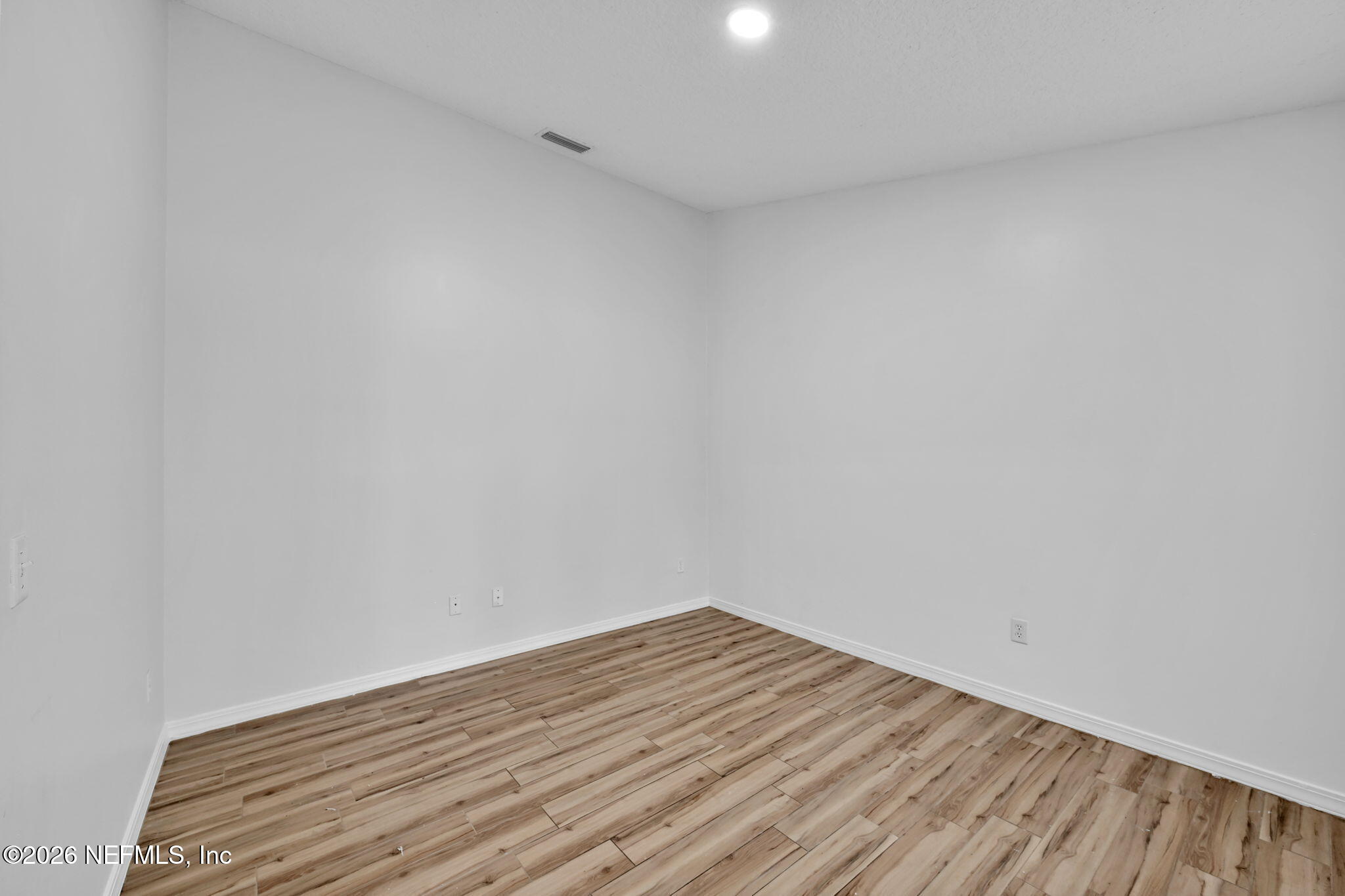1110 Woodlawn Road, Unit D St. Augustine, FL 32084 - Photo 9 of 40 a view of empty room with wooden floor