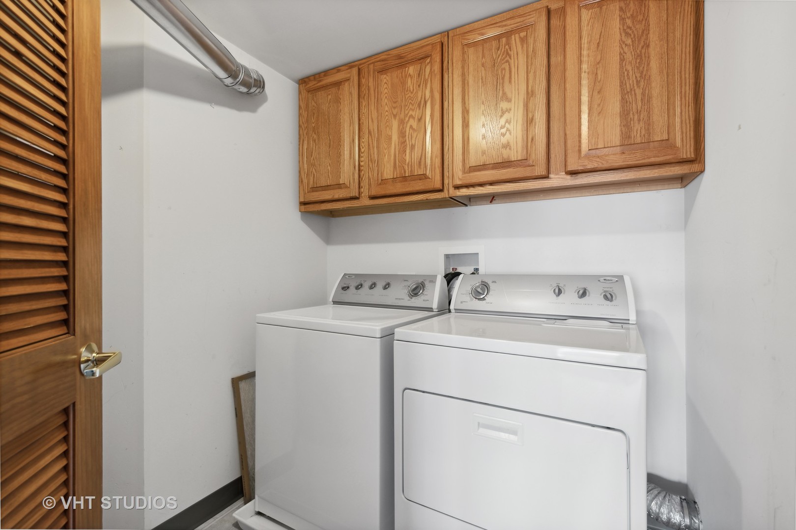 201 West Brush Hill Road, Unit 102 Elmhurst, IL 60126 - Photo 11 of 18 a utility room with dryer and washer
