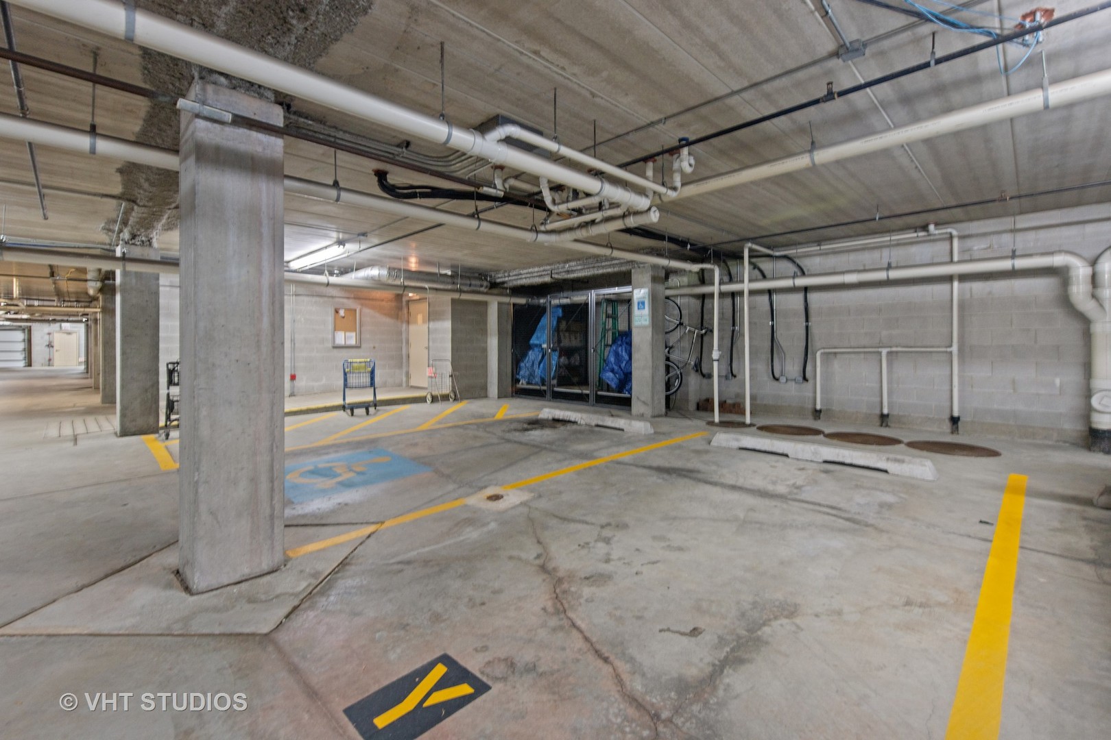 201 West Brush Hill Road, Unit 102 Elmhurst, IL 60126 - Photo 17 of 18 a view of a indoor garage