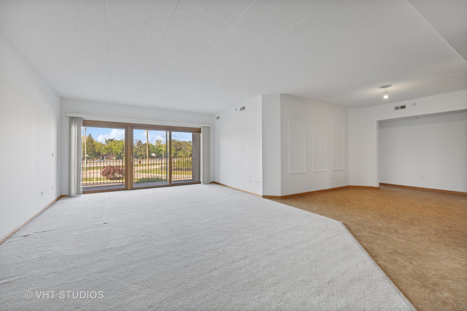 201 West Brush Hill Road, Unit 102 Elmhurst, IL 60126 - Photo 5 of 18 a view of an empty room with a window