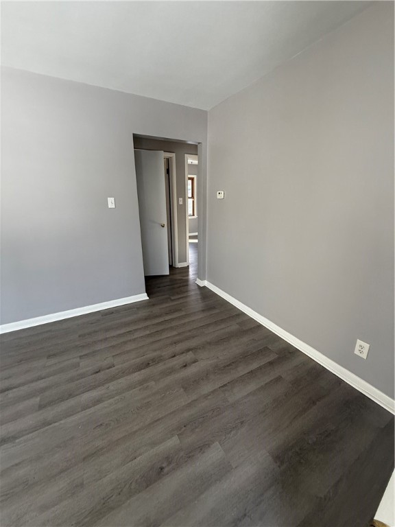 56 Maple Court Decatur, IL 62526 - Photo 4 of 31 a view of an empty room with wooden floor and closet