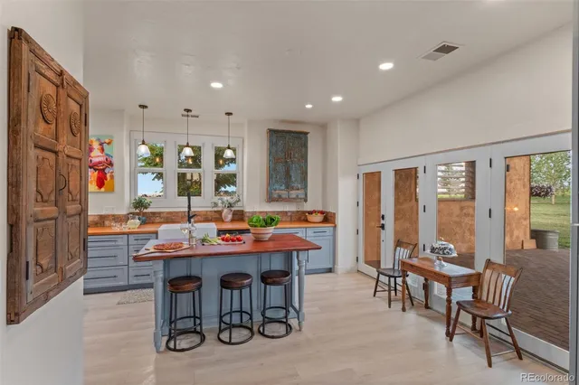 a view of a dining area with furniture window and outside view