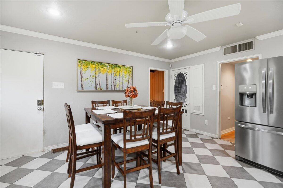 3607 27th Street Lubbock, TX 79410 - Photo 15 of 30 a view of a dining room with furniture