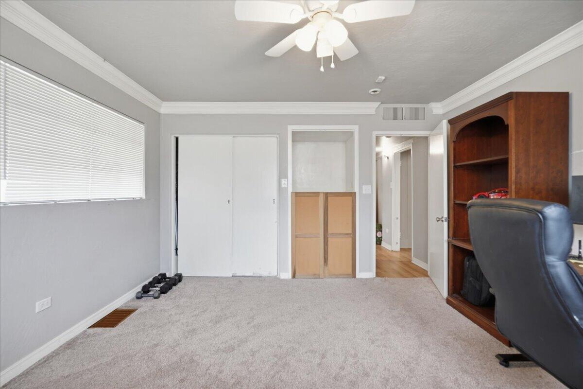 3607 27th Street Lubbock, TX 79410 - Photo 25 of 30 a view of a livingroom with a staircase