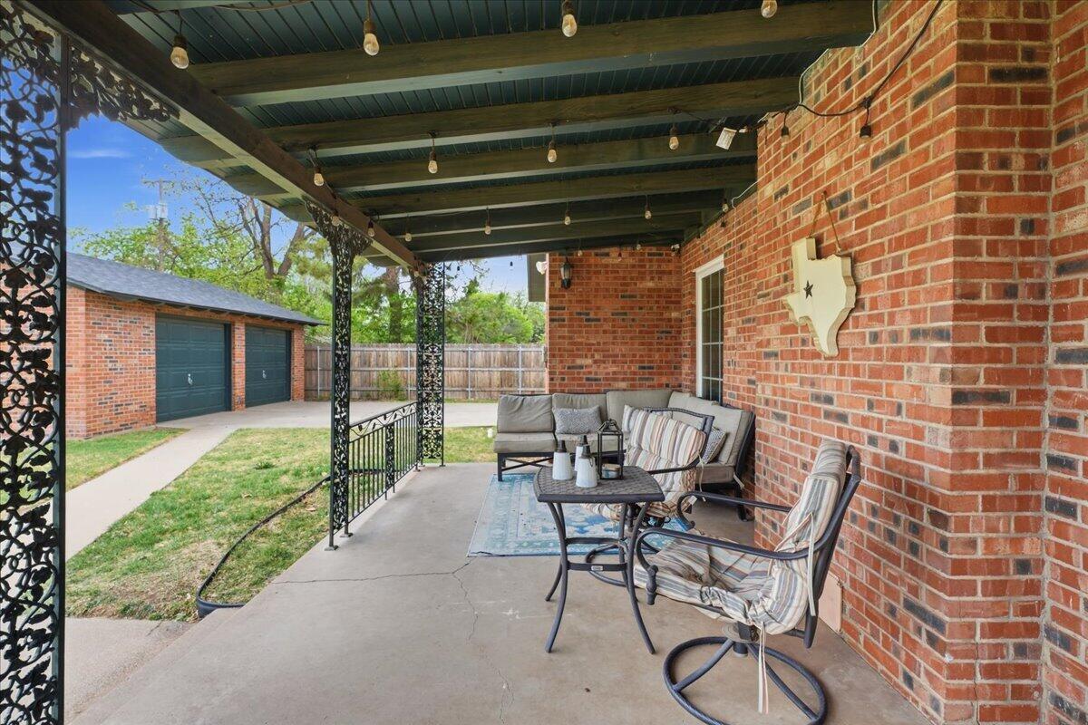 3607 27th Street Lubbock, TX 79410 - Photo 27 of 30 a garden view with a seating space