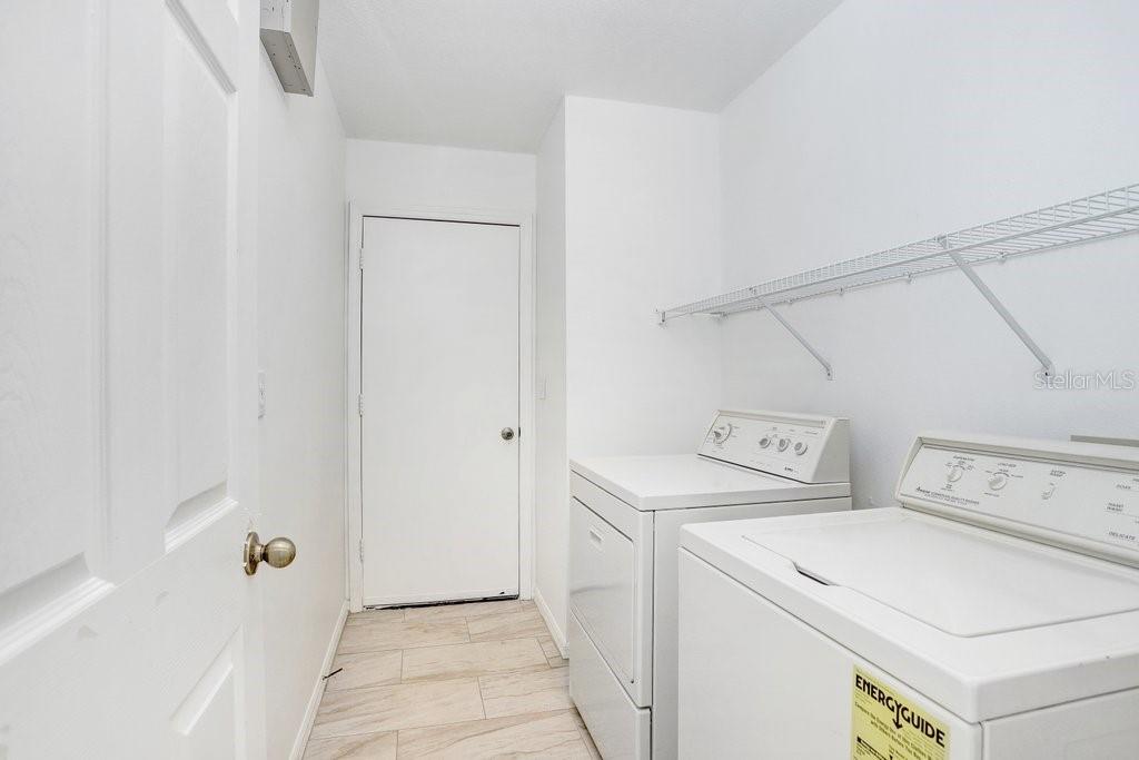 517 Royal Ridge Street Valrico, FL 33594 - Photo 19 of 30 a utility room with dryer and washer