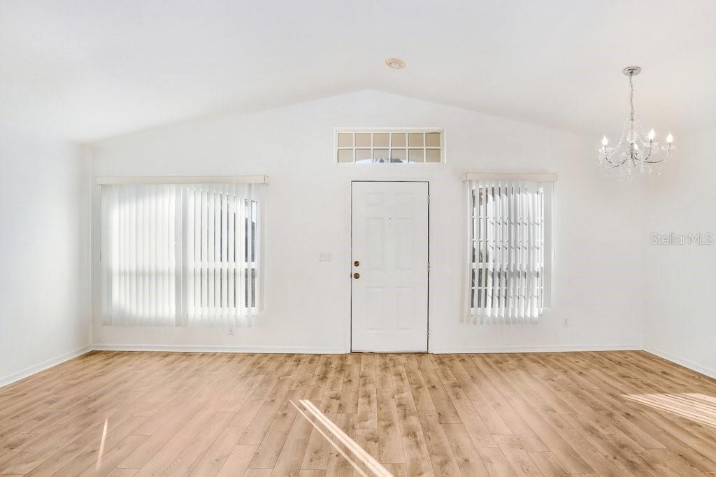 517 Royal Ridge Street Valrico, FL 33594 - Photo 3 of 30 a view of an empty room with a window