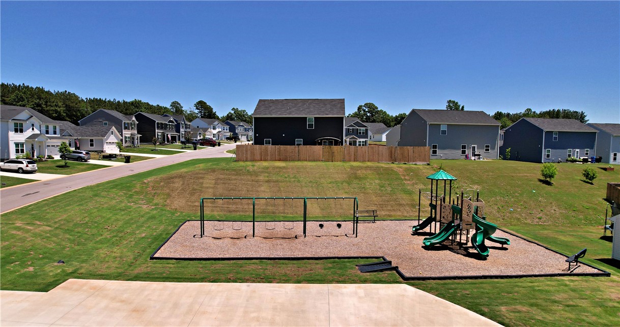 723 Peridot Way Westminster, SC 29693 - Photo 41 of 45 A vibrant neighborhood green space with a playground, perfect for community gatherings.