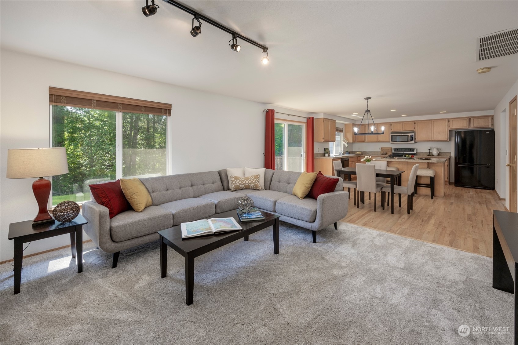 14439 Southeast 185th Place Renton, WA 98058 - Photo 16 of 36 a living room with furniture and a large window