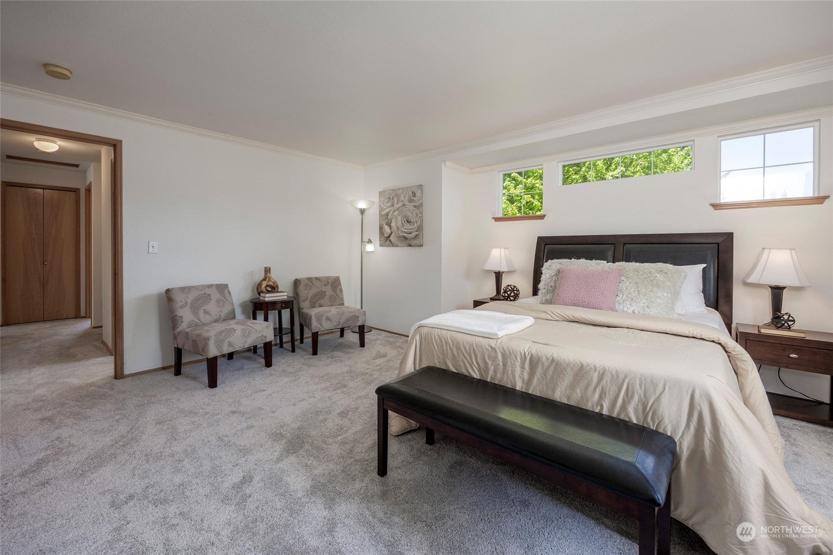 14439 Southeast 185th Place Renton, WA 98058 - Photo 20 of 36 a bedroom with a bed and a chair