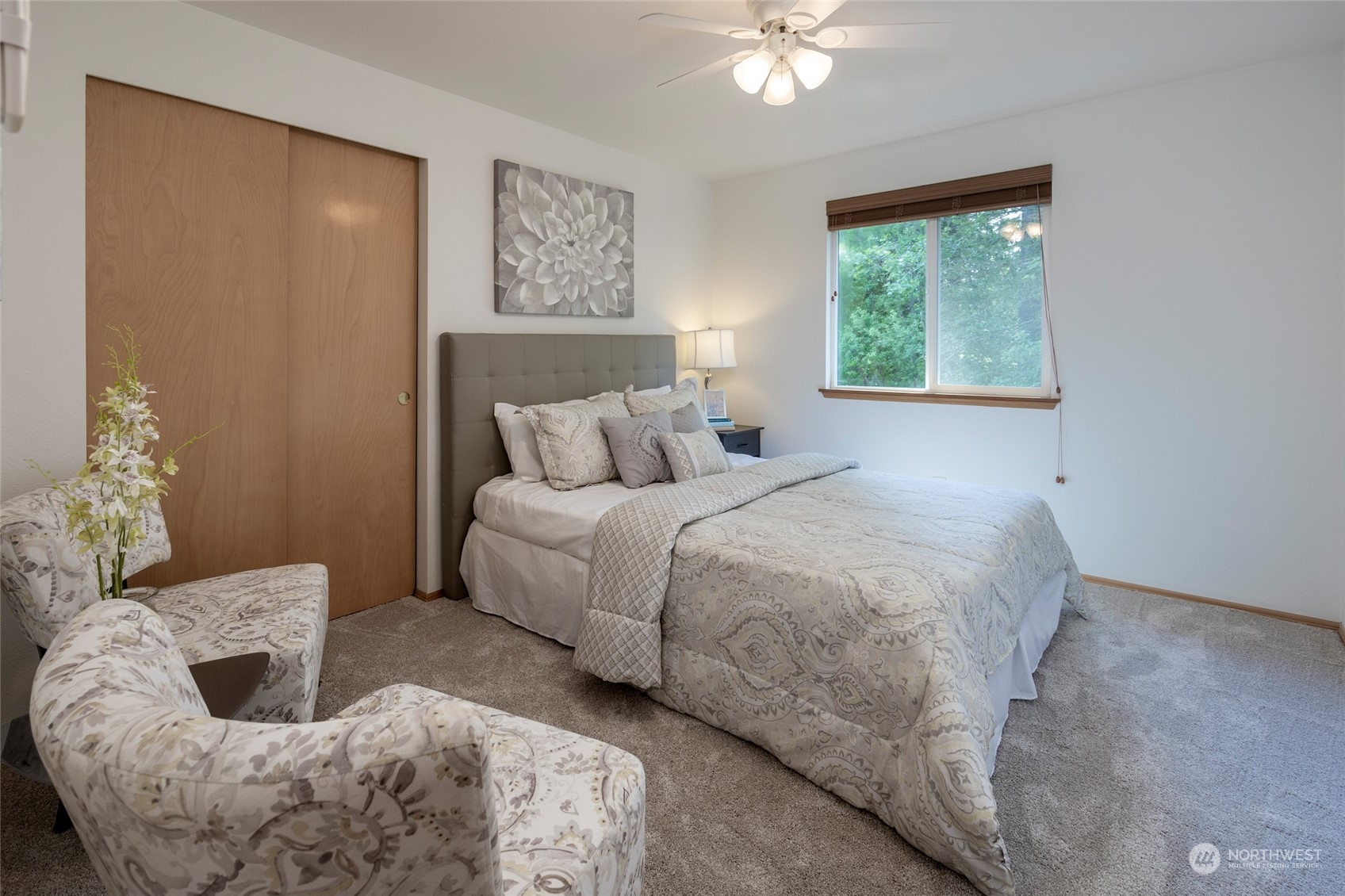 14439 Southeast 185th Place Renton, WA 98058 - Photo 26 of 36 a bed room with a bed and a couch