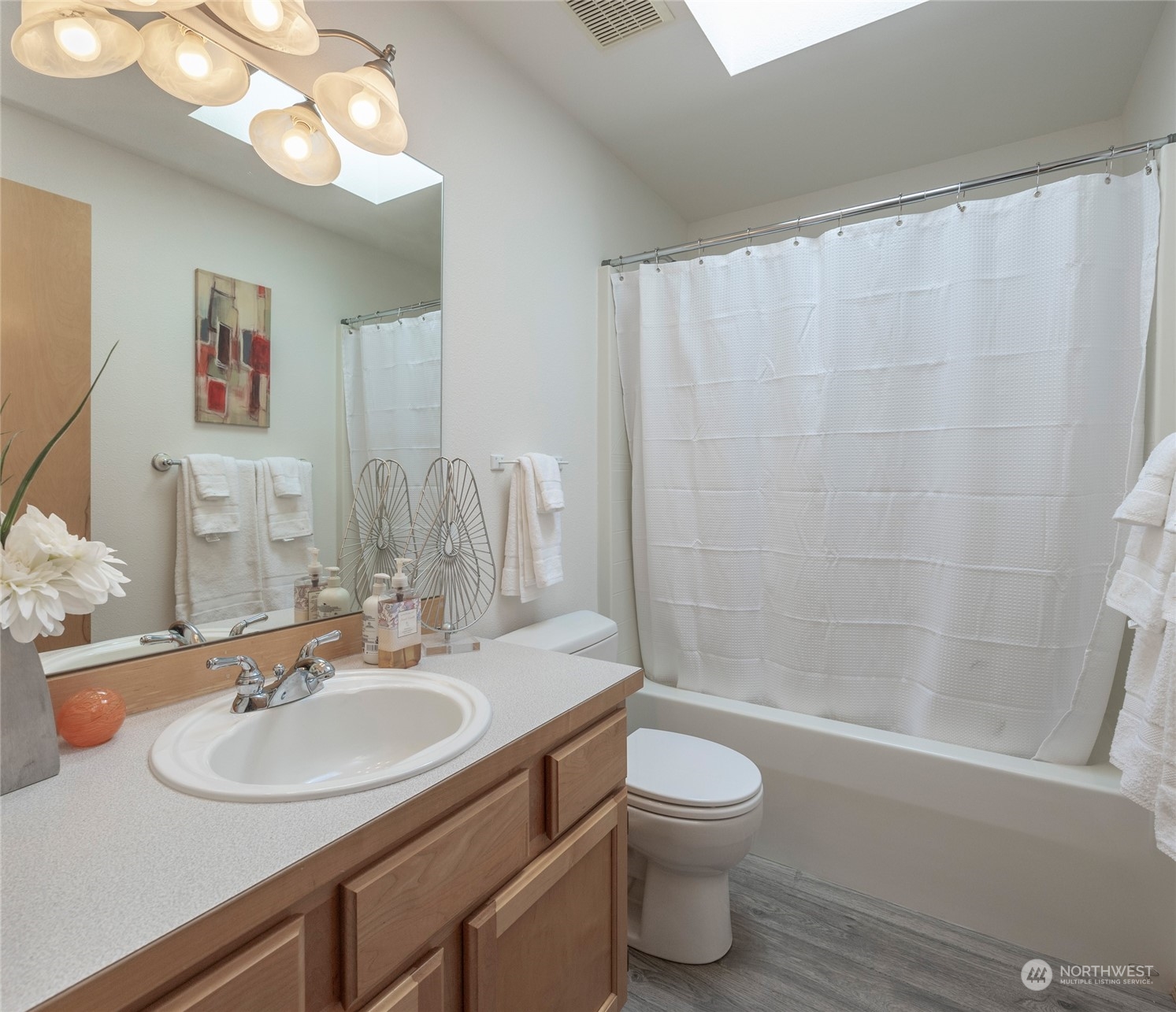 14439 Southeast 185th Place Renton, WA 98058 - Photo 27 of 36 a bathroom with a sink a toilet and shower