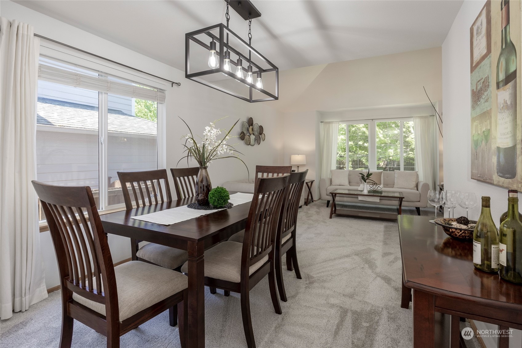 14439 Southeast 185th Place Renton, WA 98058 - Photo 6 of 36 a view of a dining room with furniture window and outside view