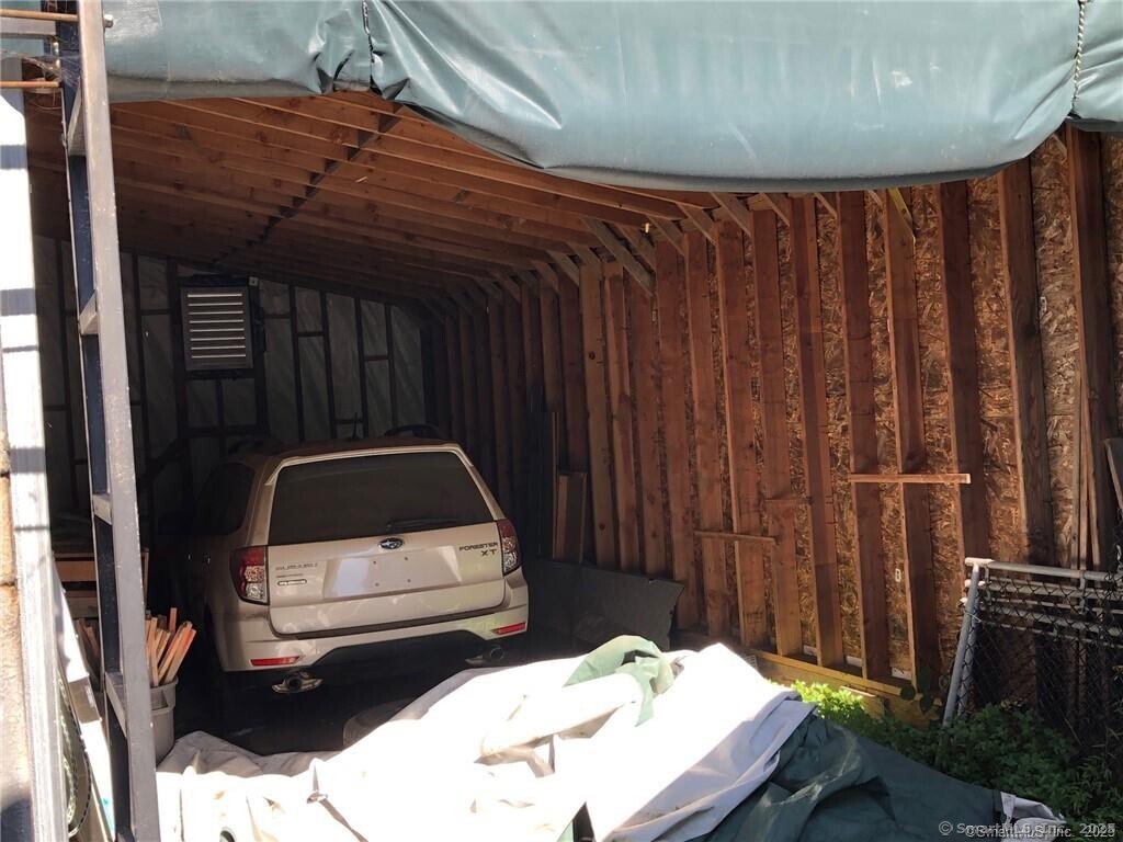 0 Thornton Street Milford, CT 06461 - Photo 5 of 5 a utility room with a car parked