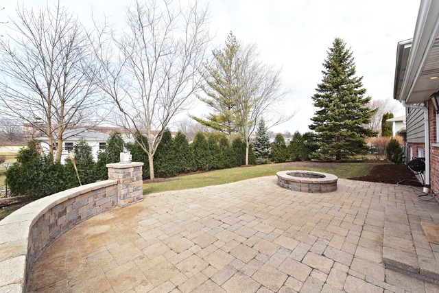 7706 Sawyer Road Darien, IL 60561 - Photo 10 of 10 a view of outdoor space with garden and trees