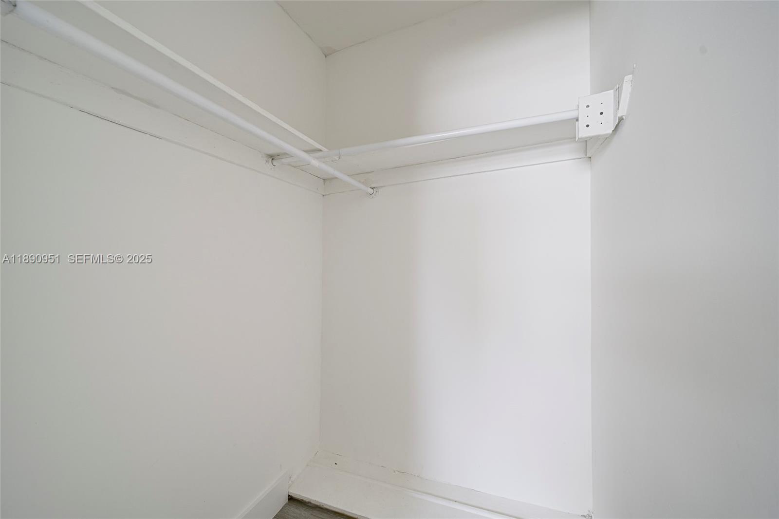 6735 Northwest 2nd Court, Unit 1 Miami, FL 33150 - Photo 22 of 27 a view of a room with shelf