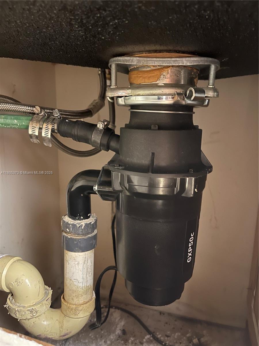 6071 Northwest 61st Avenue, Unit 311 Tamarac, FL 33319 - Photo 10 of 13 a close view of water heater