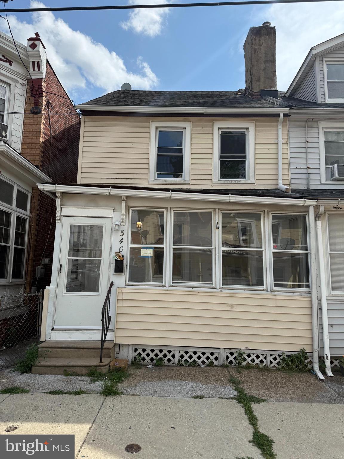 340 Middlesex Street Gloucester City, NJ 08030 - Photo 2 of 35 a view of a white house with large windows