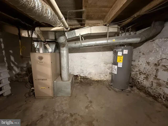 a view of a room with wooden walls