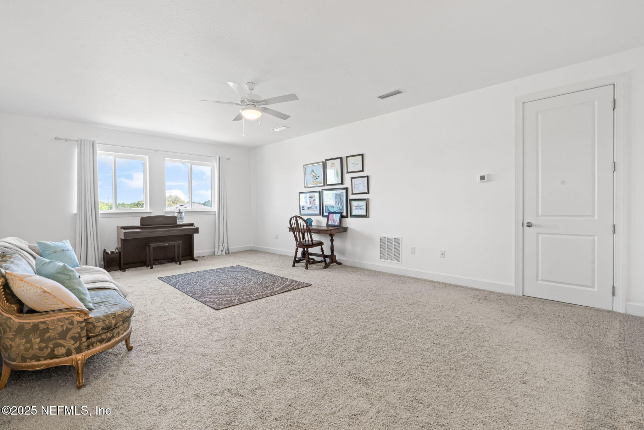 63 Braddock Court St. Augustine, FL 32092 - Photo 45 of 64 a living room with furniture and a window