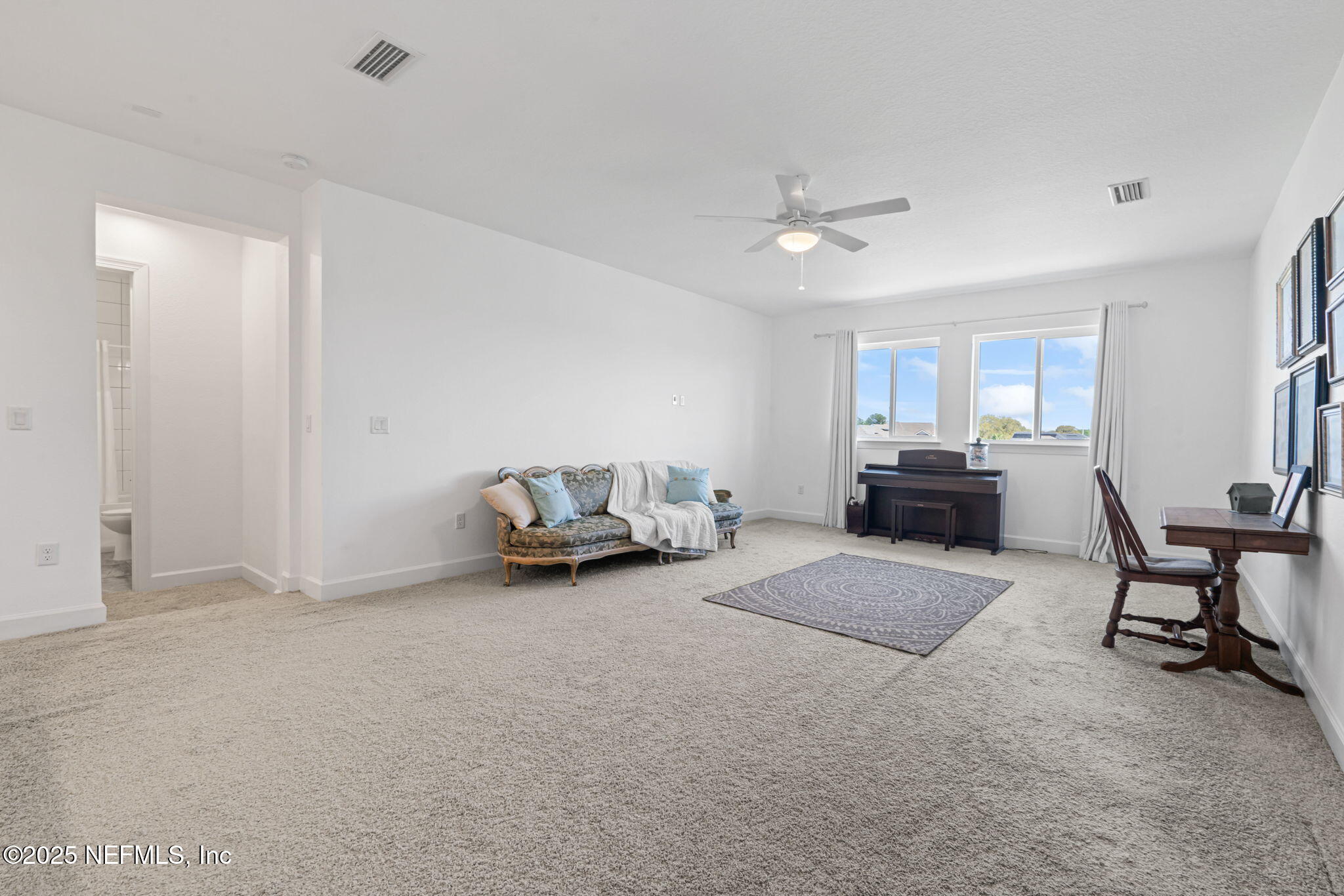 63 Braddock Court St. Augustine, FL 32092 - Photo 47 of 64 a living room with furniture and a couch