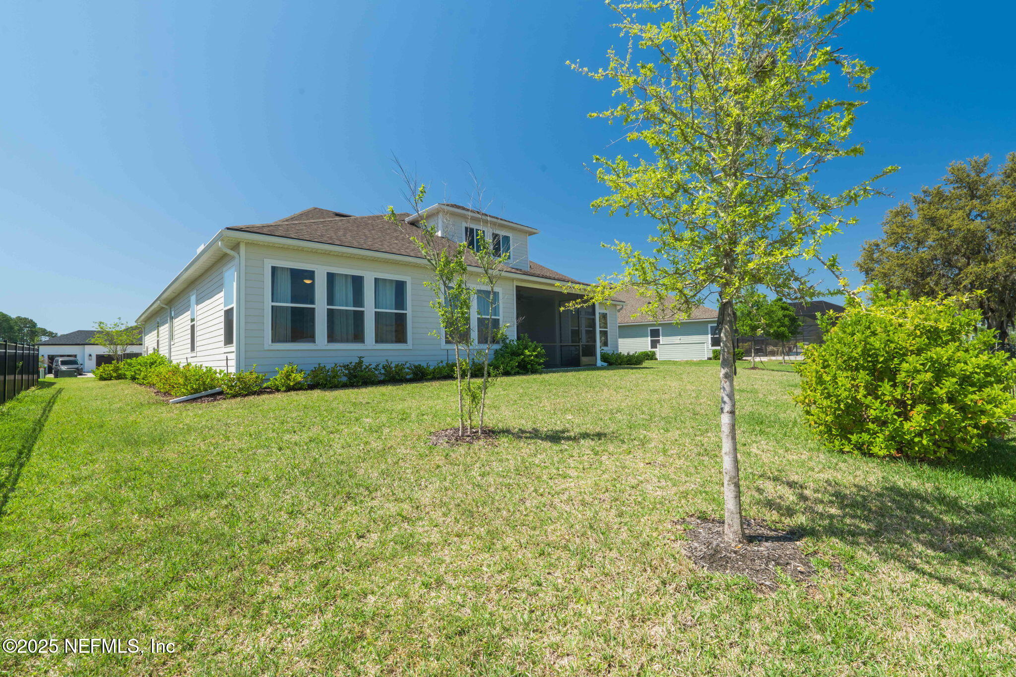 63 Braddock Court St. Augustine, FL 32092 - Photo 54 of 64 a house view with a garden space
