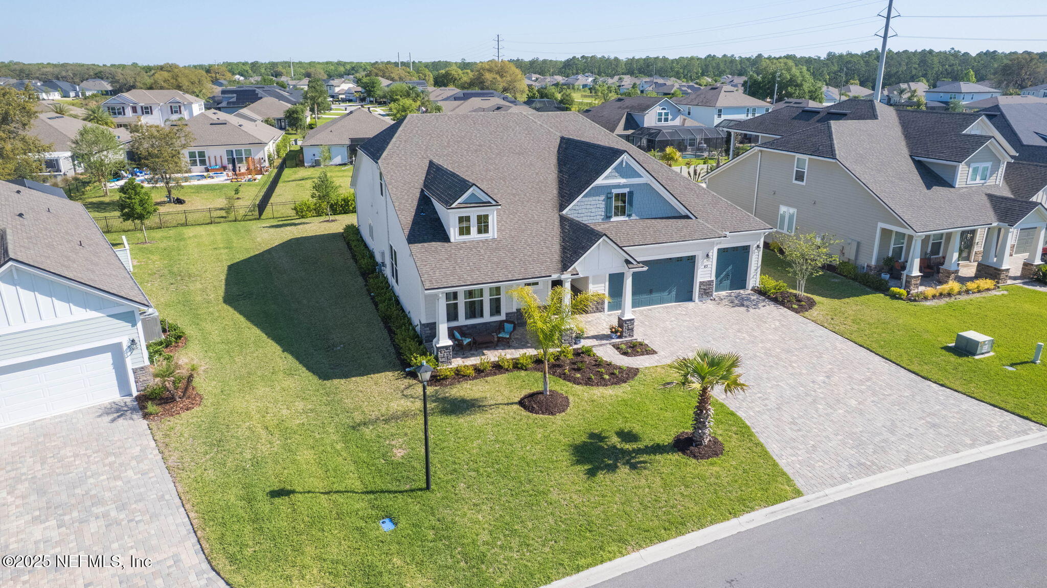 63 Braddock Court St. Augustine, FL 32092 - Photo 59 of 64 an aerial view of residential houses with outdoor space and parking
