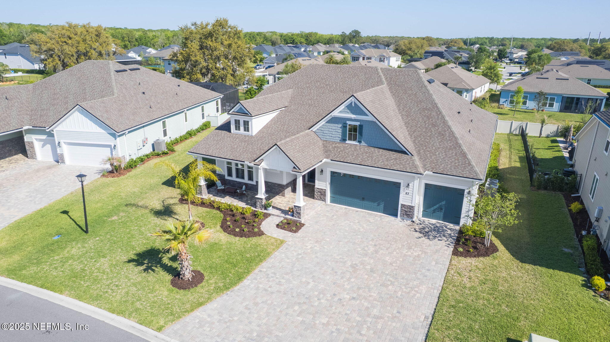 63 Braddock Court St. Augustine, FL 32092 - Photo 60 of 64 an aerial view of a house with yard