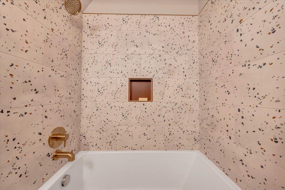 3851 Joppa Mill Road Moneta, VA 24121 - Photo 87 of 104 a bathroom with a bathtub and a shower