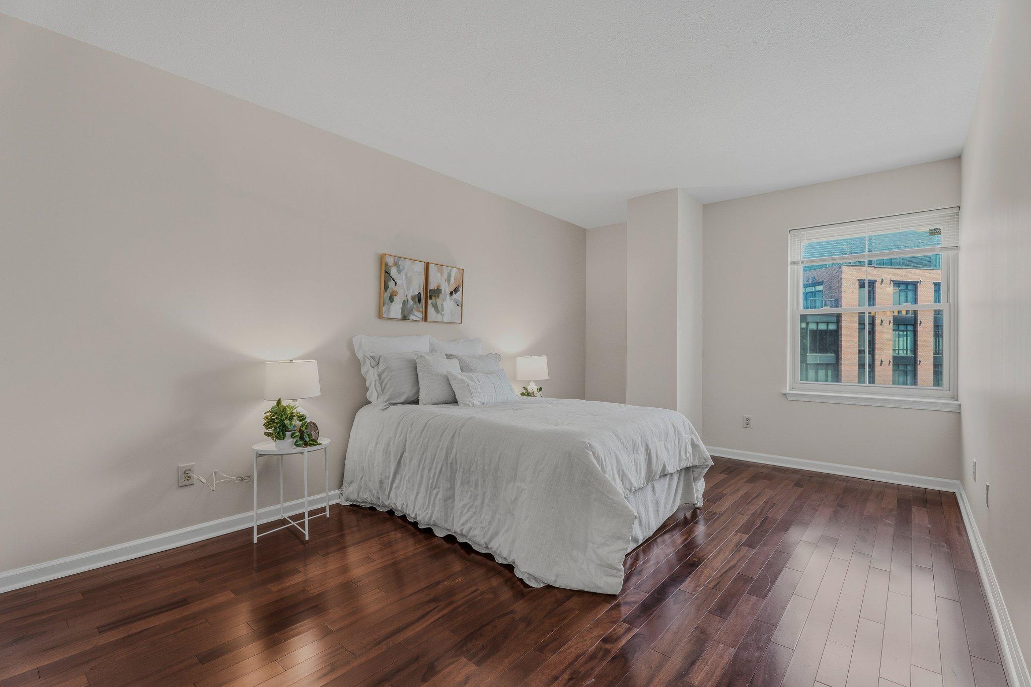 960 Fell Street, Unit 308 Baltimore, MD 21231 - Photo 22 of 38 Serene primary bedroom with natural light.