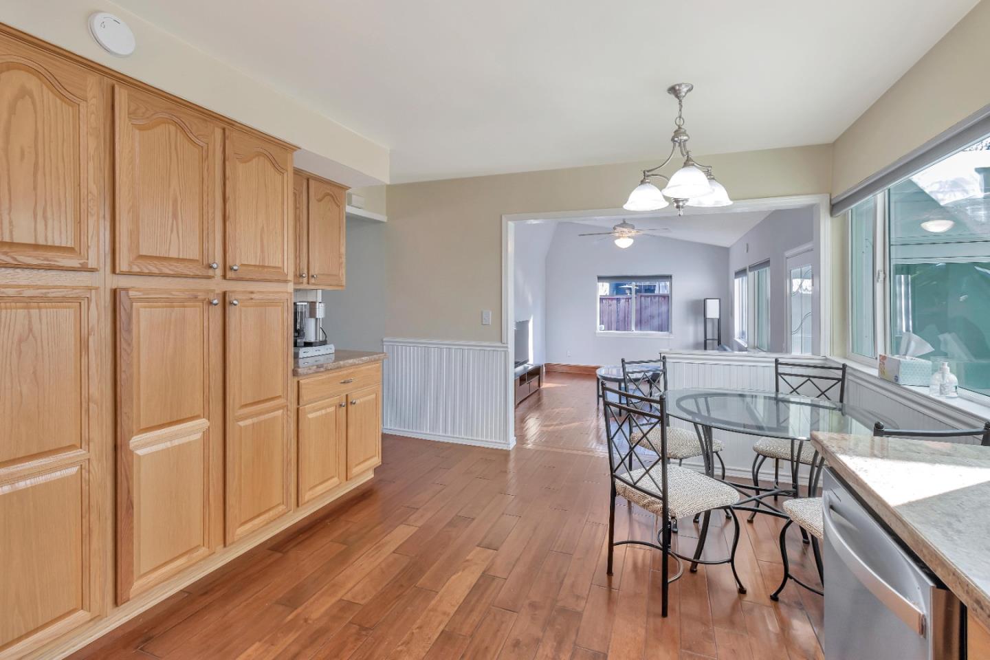 360 Henderson Drive San Jose, CA 95123 - Photo 14 of 37 a view of a dining room with furniture window and wooden floor