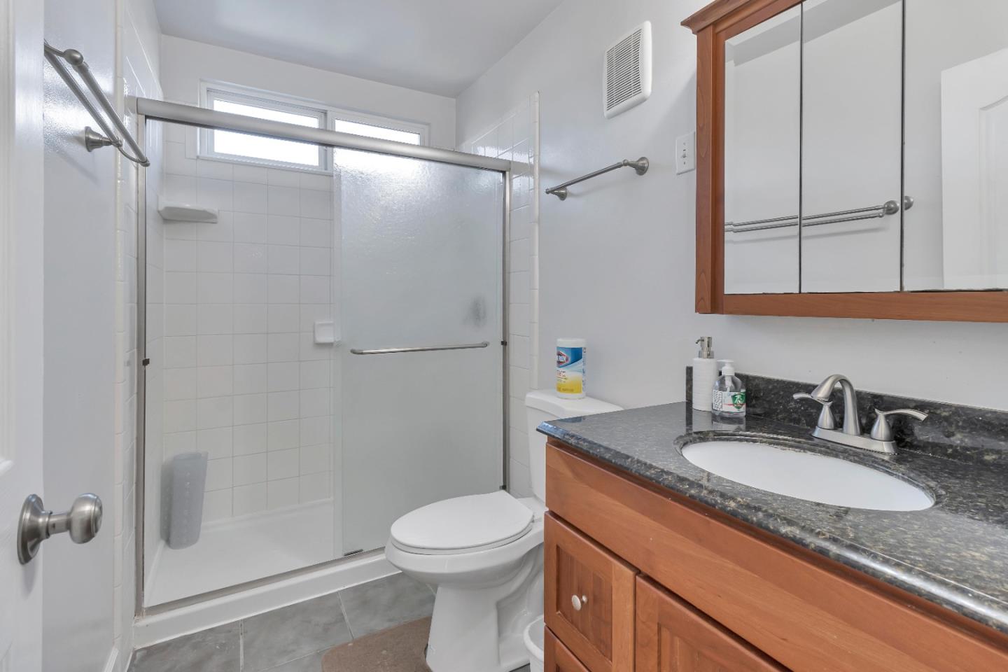 360 Henderson Drive San Jose, CA 95123 - Photo 25 of 37 a bathroom with a granite countertop sink toilet and shower