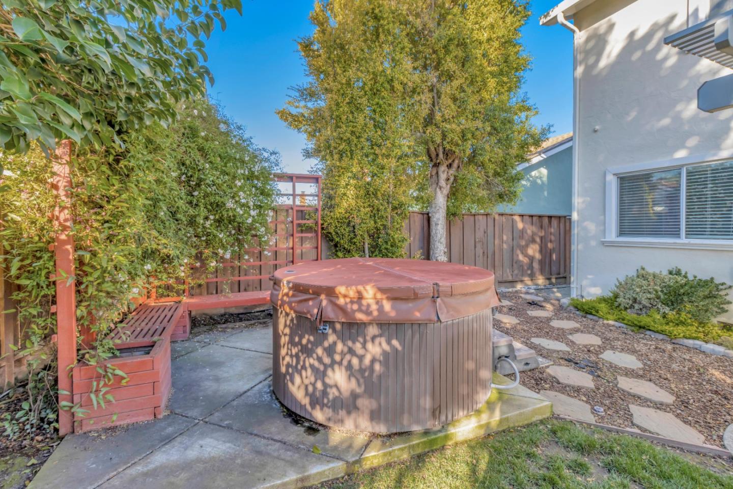 360 Henderson Drive San Jose, CA 95123 - Photo 33 of 37 a view of a patio with table and chairs with wooden fence and plants