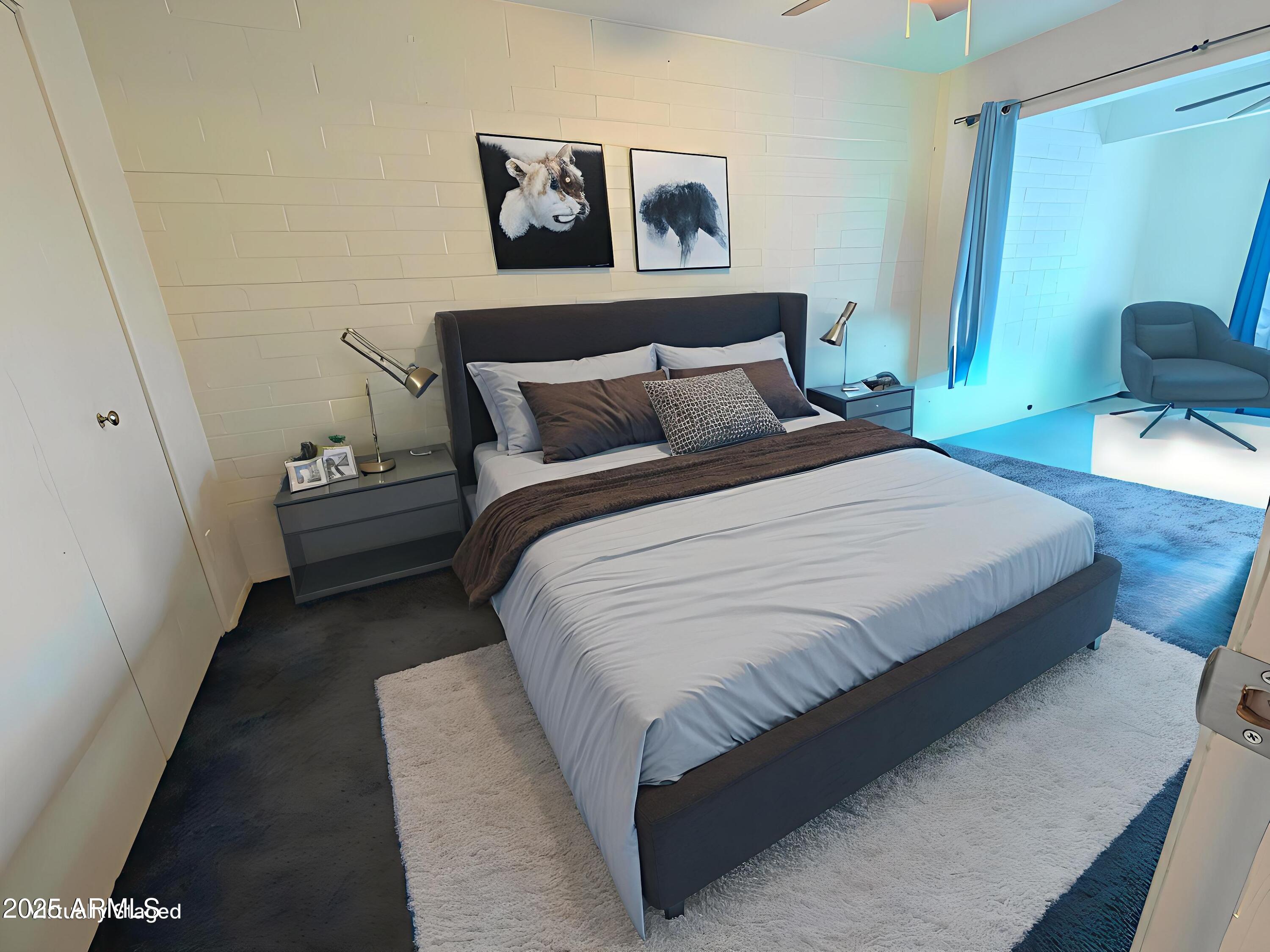 2610 West Berridge Lane, Unit 121 Phoenix, AZ 85017 - Photo 8 of 18 a bedroom with bed and cupboard