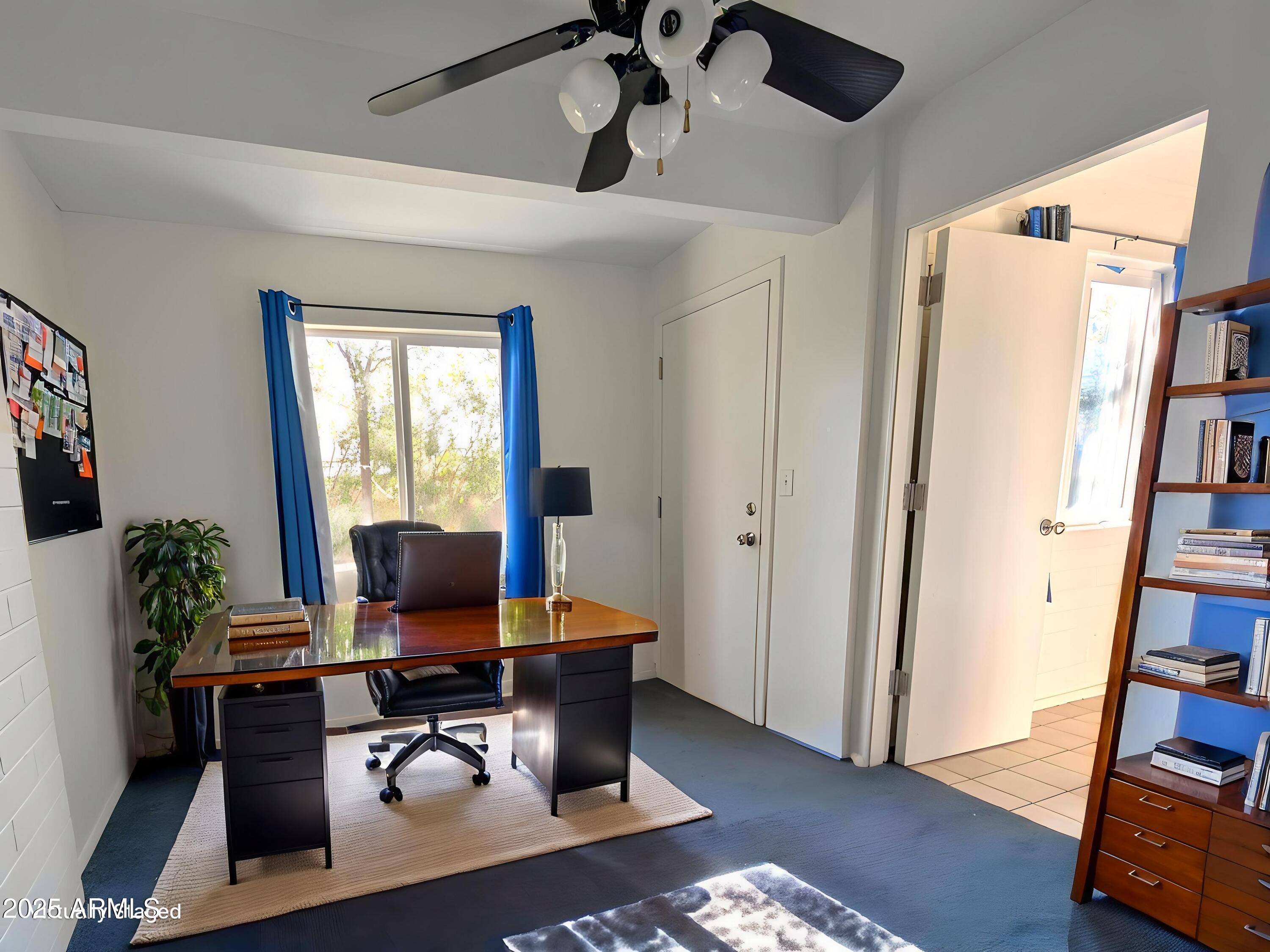 2610 West Berridge Lane, Unit 121 Phoenix, AZ 85017 - Photo 10 of 18 a workspace with furniture and a window