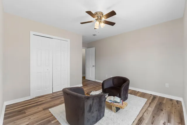 a workspace with furniture and wooden floor