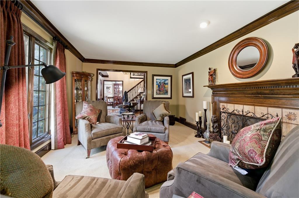 4220 Greentree Lane Southwest Atlanta, GA 30349 - Photo 16 of 42 a living room with furniture and a large window