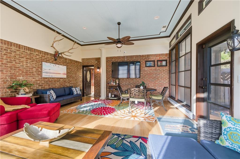 4220 Greentree Lane Southwest Atlanta, GA 30349 - Photo 20 of 42 a view of a livingroom with furniture lamp and a chandelier