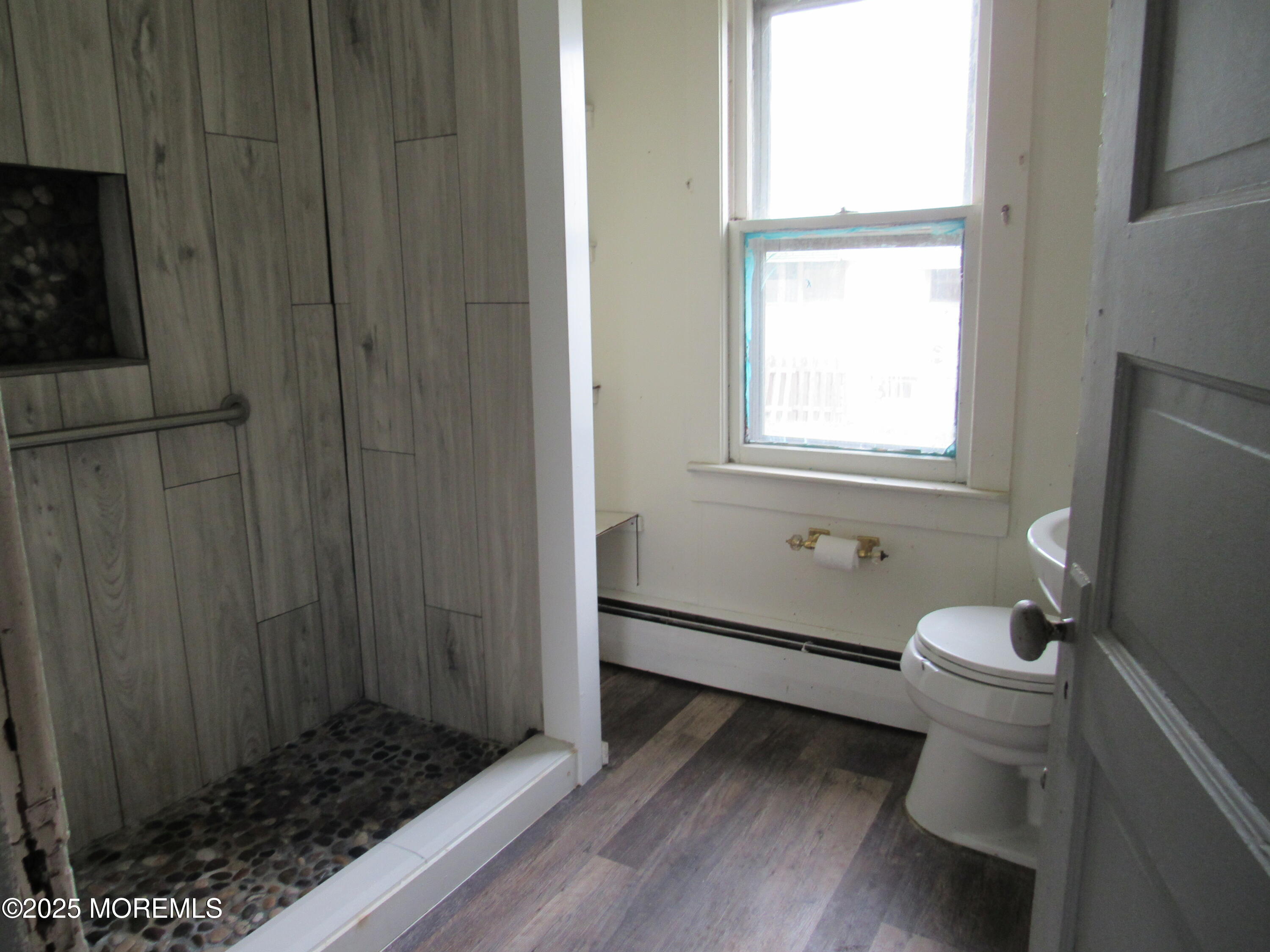 896 Highway 9 Little Egg Harbor, NJ 08087 - Photo 9 of 14 a bathroom with a sink toilet and shower
